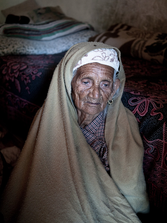 90 year old Nepalese grandmother in her room.